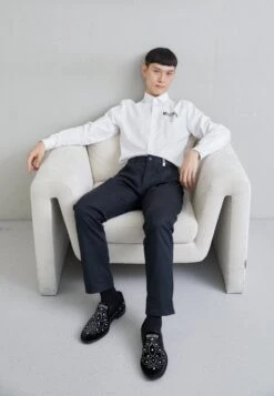 MOSCHINO Shiny StudsScarpe Senza LacciBlack Uomo Scarpe Basse 6MO12C015-Q11 10 MOSCHINO Shiny StudsScarpe Senza LacciBlack Uomo Scarpe Basse 6MO12C015-Q11 -Chic Scarpe Negozio 6a344bb21661456d9d79fe259fe521d0