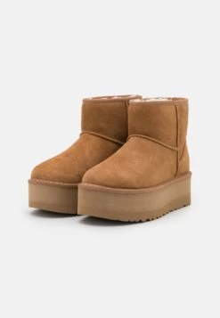 Ugg Classic Mini PlatformStivaletti Con PlateauChestnut Donna Stivaletti UG111X06Z-O11 8 Ugg Classic Mini PlatformStivaletti Con PlateauChestnut Donna Stivaletti UG111X06Z-O11 -Chic Scarpe Negozio d4a497a2199d44d3b342505fc609886b